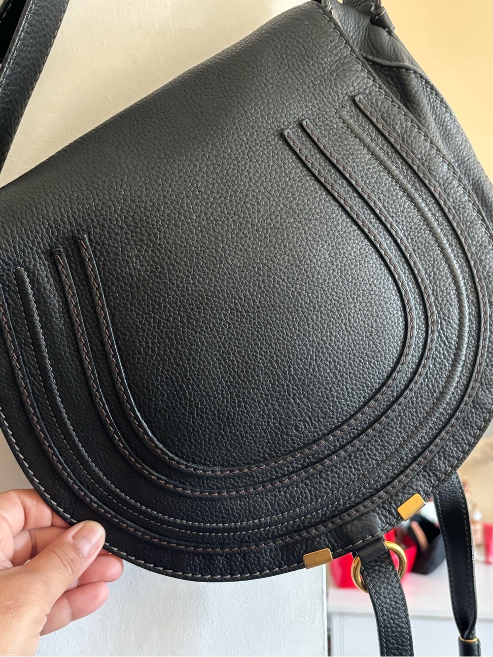 Chloe Black Leather Curved Saddle Crossbody with Gold Accents